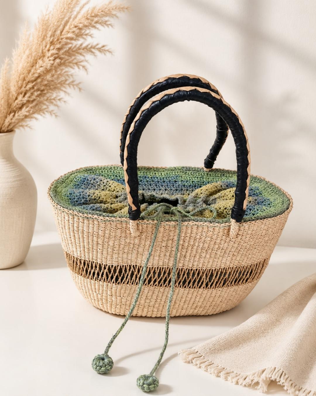hand Bolga basket Handmade, with a crochet bag inside the basket. hand Bolga basket Handmade, with a crochet bag inside the basket.